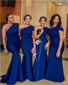 four beautiful women in blue dresses posing for a photo with the caption pinupi