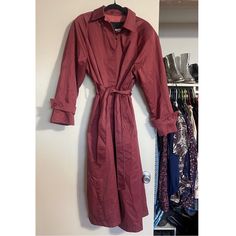 London Towne Vintage Maroon Belted Button Up Trench Coat Duster Sz 14 This Fabulous Duster Trench Is A Maroon / Warm Plum / Dusty Rose Color Is Excellent Used Condition, I Can Find No Signs Of Wear Or Missing Buttons. The Lining Is Exceptional With Vibrant Plaid, This Type Of Plaid Always Makes Me Think Of Vivienne Westwood And These Types Of Vintage Trench Coats Also Make Me Think Of Where In The World Is Carmen San Diego?! To My Understanding The Jacket Itself Is Washable But The Zip Out Linin Burgundy Long Sleeve Business Outerwear, Burgundy Long Sleeve Outerwear For Work, Classic Purple Outerwear With Buttons, Purple Single-breasted Outerwear For Work, Purple Button-up Outerwear For Work, Purple Button-up Outerwear With Button Closure, Purple Button-up Outerwear, Purple Long Sleeve Outerwear With Buttons, Burgundy Long-sleeved Outerwear For Office