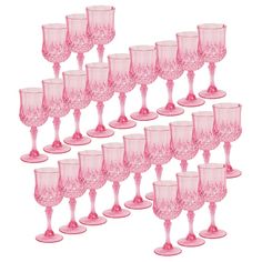 a set of twelve pink goblets sitting next to each other on a white background