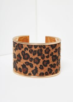 This gold-tone cuff is every bit of purrrr-fect with its leopard spots accentuating the faux fur. Leopard Bracelet, Bracelet Cute, Leopard Spots, Cute Costumes, Ashley Stewart, Crystal Bracelet, Bra Cups, Crystal Bracelets, Gold Tone Metal