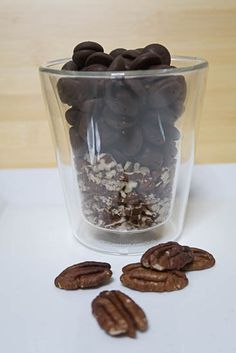 some pecans and chocolate chips in a glass bowl