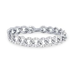 Crafted in a trending curb chain design, this tennis bracelet features round brilliant cut diamonds totaling 9.58 carats. Diamond Tennis Bracelet With Oval Link And Accents, Oval Link Diamond Tennis Bracelet With Accents, Oval Link Diamond Tennis Bracelet With Diamond Accents, Elegant Diamond Cut Cuban Link Chain Bracelet, Elegant Cuban Link Chain Bracelet With Diamond Cut, Elegant Cuban Link Diamond Cut Bracelets, Diamond Link Bracelet With Jubilee Design, Elegant Diamond Cuban Link Tennis Bracelet, Elegant Cuban Link Bracelet With Diamond Accents