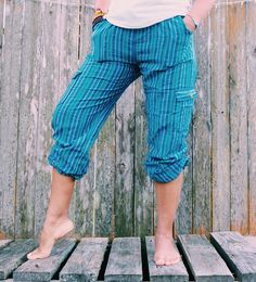 "Our Inca pants are a cultural experience and travelers' favorite. These lounge pants are comfortable, lightweight, stylish, fresh, and relaxing. With banded waist and drawstrings in the waist and legs, they could be adjusted to fit your style and comfort. Whether they are used as Capri or Flat pants style, Inca pants are perfect for any weather conditions and for any occasion. They look great on Men or Women of any age. - Banded waist/Drawstrings in waist and leg - Four pockets, 2 front and 2 s Casual Green Yoga Pants With Pockets, Spring Casual Parachute Yoga Pants, Casual Capri Length Yoga Pants For Summer, Cotton Capri Pants For Beach, Casual Summer Parachute Pants For Yoga, Casual Yoga Harem Pants With Pockets, Casual Summer Harem Pants For Outdoor, Beach Cotton Capri Pants, Casual Yoga Capris