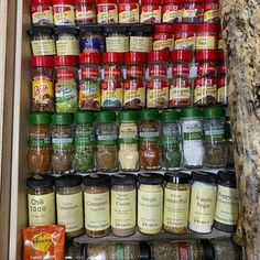 the spice rack is full of spices and seasonings