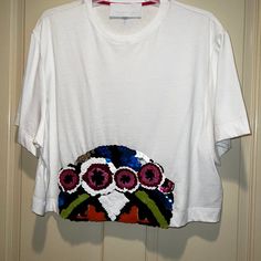 Cropped Cotton T-Shirt With Sequencing. Believed To Be From The 2019 Spring Collection. Never Worn. Pit To Pit 23", Neck To Lower Hem 17". Very Cool Look! White Embellished Crew Neck T-shirt, White Embellished Cotton Tops, White Cotton Sequin Top, Embellished Graphic Tee With Crew Neck, White Embellished Crew Neck Top, Summer Cotton Tops With Sequins, Spring Embellished Crew Neck T-shirt, Summer Sequined Crew Neck Top, Embellished Crew Neck T-shirt For Spring