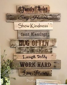 a wooden sign with words on it that say, stay home show kindness count blessings hug often for everyone always laugh work hard