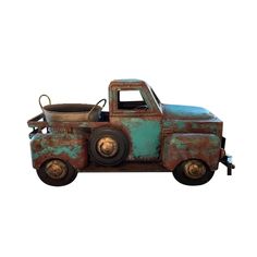 an old rusted truck with a bucket on the back and wheels, isolated against a white background