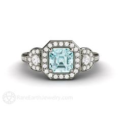 Aquamarine Diamond Halo Engagement Ring Asscher Cut Three 3 Stone Ring by Rare Earth Jewelry Engagement Ring 3 Stone, Ring 3 Stone, Asscher Cut Engagement Rings, Earth Jewelry, Aqua Ring, March Birthstone Ring, Blue Gemstone Rings, Black Diamond Engagement, Engagement Rings Affordable