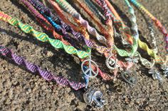 "Each necklace is handmade with 100% natural, high quality 2mm thick hemp cord as filler cords for lasting durability & your choice of 1mm variegated hemp cord. Accented with your choice of charm, tied into a flat/spiral knot design. Necklace measures approx 16\" and adjusts up to 20\" with loop & bead closure. This item is MADE TO ORDER and can take up to 1 week to be made & shipped. If you need it by a certain time please message me BEFORE purchasing! Thank you!! :)" Hippie Festival Jewelry With Adjustable Cord, Hippie Adjustable Cord Necklace For Festivals, Casual Handmade Jewelry For Festivals, Casual Handmade Festival Jewelry, Casual Macrame Jewelry For Festivals, Hippie Jewelry With Adjustable Cord, Hippie Style Festival Necklaces, Bohemian Peace Sign Necklace For Gift, Handmade Casual Necklaces For Friendship