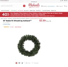 a christmas wreath is on the internet page for an advertiser's website