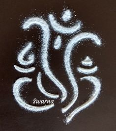 the word saura written in white chalk on a black surface with some writing underneath it