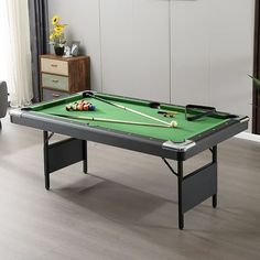 a pool table in a living room