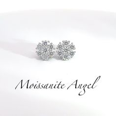 Vvs1 quality moissanite set in cluster style giving these earrings a tremendous amount of shine. Precious metal used to craft these earrings is 925 silver that will never fade. Size of these stunning studs are 10mm which will definitely get you many compliments. Studs are in hand ready to ship for fast delivery :) Wedding Cluster Earrings With Prong Set Moissanite, Wedding Moissanite Cluster Earrings With Prong Setting, Silver Moissanite Cluster Earrings, Sparkling Diamond White Cluster Earrings For Anniversary, Diamond White Sparkling Cluster Earrings For Anniversary, Anniversary Cubic Zirconia Cluster Earrings, Diamond White Cubic Zirconia Cluster Earrings In Flower Shape, Diamond White Moissanite Cluster Earrings For Anniversary, Silver Brilliant Cut Cluster Earrings