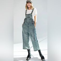 A Beautiful Vintage - Distressed Blue Denim Overalls In An Oversize/ Slouchy Design , Sooo Prettty But Unfortunately This Fit Way Too Big For Me. Medium Size, The Difference Between Small Is About 2 1/2 Inches , Just For Your Reference. Length Is About 43 Inches And About 21 Or 21 1/4 Width By The Waist. Rise From Front Of The Overalls Is About 24 Inches. Leg Width About 16 Inches. Other Measurements Are Included As Well You Can See The Photos, For Your Reference. This Is A Size Medium But Would Distressed Denim Blue Jumpsuit, Distressed Denim Jumpsuit In Denim Blue, Distressed Denim Jumpsuit For Fall, Fall Medium Wash Distressed Denim Jumpsuit, Distressed Denim Jumpsuit In Dark Wash, Blue Washed Denim Jumpsuit For Fall, Trendy Blue Distressed Denim Jumpsuit, White Lace Jumpsuit, Leather Overalls