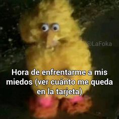 a yellow stuffed animal sitting on top of a black surface with the words hora de enfrenttame a mis medos ver cuanto me que