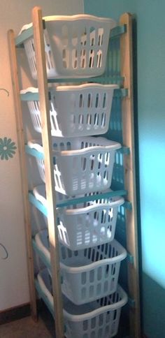 several white baskets stacked on top of each other