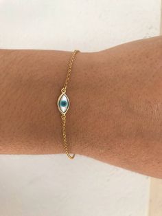 Tiny Evil Eye Bracelet Minimal Bracelet Evil Eye Bracelet | Etsy Gold Evil Eye Bangle Bracelet As Gift, Gold-plated Evil Eye Bracelet For Gift, Gold Evil Eye Bracelet With Adjustable Chain Gift, Gold Bracelet With Evil Eye For Gift, Gold Sterling Silver Evil Eye Bracelet, Dainty Gold Bracelets With Evil Eye, Gold Spiritual Evil Eye Bracelet Gift, Minimalist Gold Bracelets With Evil Eye, Gold Dainty Evil Eye Bracelet With Adjustable Chain