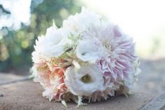 a bridal bouquet sitting on the ground