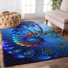 a rug with a peacock sitting on top of it