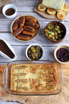 the food is ready to be eaten and served on the wooden table with other dishes