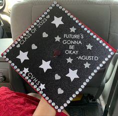 someone is holding up a graduation cap that says future's gon na be okay