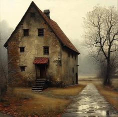 an old house with a red roof next to a wet road in the country side