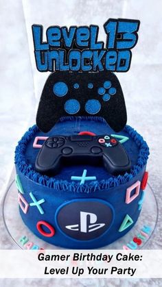 a birthday cake with a video game controller on top