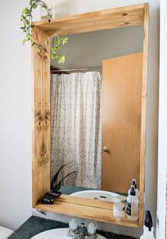 a bathroom sink with a mirror above it