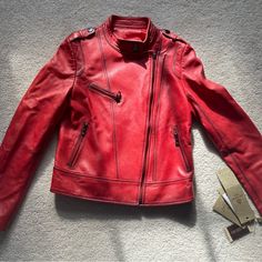 Women’s Xs Red Leather Jacket With Zippers. The Leather Is Very Soft. Never Worn. This Is A Gift From A Friend But It Does Not Fit Me Well. Open To Offers Casual Red Leather Jacket With Zipper, Spring Red Leather Jacket, Red Biker Outerwear With Zipper Closure, Black And Gold Jacket, Fitted Red Leather Jacket With Pockets, Red Leather Biker Outerwear, Black Leather Blazer, Designer Leather Jackets, Blue Leather Jacket