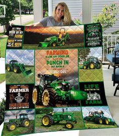 a woman holding up a blanket with pictures of farm equipment on it