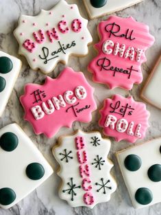 some decorated cookies are sitting on a table