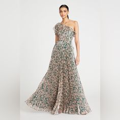 About The Brand: Celebrity Favorite For Evening Gowns, Cocktail Dresses And Bridal Wear. Aurelia Pleated Gown In Etched Wildflower With Accordion Pleated Design And Ruffle Trim Approximately 60in From Shoulder To Hem Model Is 5'11 And Is Wearing A Size 4. Measurements May Vary Slightly By Size. Center Back Zipper With Hook-And-Eye Closure Body: 66% Silk, 34% Polyester Lining: 100% Polyester Dry Clean Only Imported All Of My Items Are 100%Guaranteed Authentic . Please Read All The Details And Che Spring Wedding Gown Pre-draped Style, Spring Wedding Pre-draped Gown, Pre-draped Floor-length Gala Dress, Pre-draped Floor-length Dress For Gala, Spring Formal Gown With Sweep Train, Spring Formal Pre-draped Gown, Theia Couture, Gown Rental, Pleated Gown