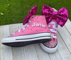 Pink Barbie Blinged Converse Sneakers, Infants and Toddler Sneakers These authentic Pink Converse have high quality glass crystals, Converse emblem and back of the shoe. They are accessorized with a pink sequin bow. Information about the shoes All sneakers are Converse brand and have a mix of hand applied high quality glass crystals and resin flat-backs. Please select your color choice by the available drop down options, an option of all glass crystals no color is also available. Converse sizing Ladybug Tutu, Dresses Halloween, Birthday Party Dresses, Bling Converse, 1st Birthday Tutu, Handmade Tutu, Pink Converse, Pink Barbie, Toddler Sneakers