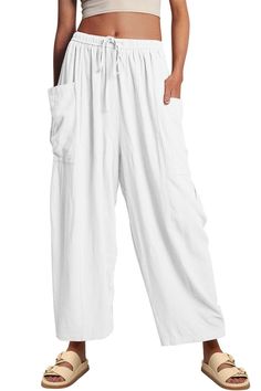 Elevate your wardrobe with our Tourist Full Size Pocketed Drawstring Wide Leg Pants. Crafted with convenience in mind, these pants feature a drawstring waist and ample pockets for all your travels. Whether exploring a new city or lounging at home, these pants provide both style and functionality, making them a must-have for any refined traveler. Features: Pocketed Sheer: Opaque Material composition: 100% Polyester Care instructions: Machine wash cold. Tumble dry low. Imported Product measurement Cotton Linen Trousers, High Waist Wide Leg Pants, Solid Color Pants, Weave Style, Pantalon Large, Linen Trousers, Casual Fits, Workout Pants, Cotton Linen