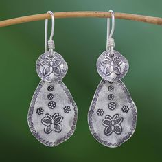 Crafted by hand from silver round circles and teardrops are stamped with oxidized butterfly and floral patterns. Thailand's Pakaon Sojintarit presents these dangle earrings which are created by Karen hill tribe artisans. Each earring swings from a hook of sterling silver. Butterfly Motif, Butterfly Crafts, Hill Tribe Silver, Hammered Sterling Silver, Silver Dangle Earrings, Sterling Silver Cuff Bracelet, Sterling Silver Hoop Earrings, Sterling Silver Cuff, Sterling Silver Hoops