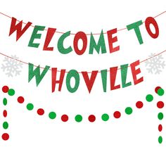 a welcome sign with snowflakes hanging from it's sides and the words, welcome to whovillee