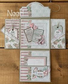 the inside of a card with flowers and laces on it, including two tags