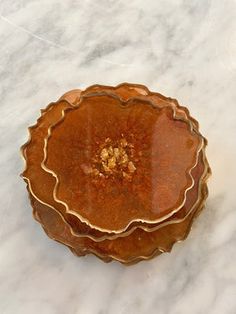 a brown plate sitting on top of a white counter