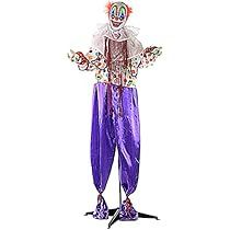 the clown is dressed in purple and white