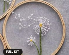 the embroidery kit is being used to make dandelions