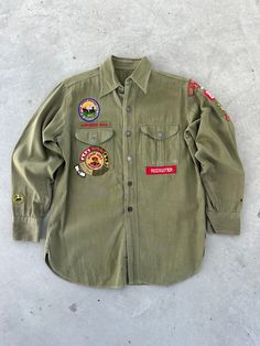 Adult Medium 20" pit to pit 28" length 19" sleeves pit to cuff Adult recruiter uniform shirt 1952-1953 patches Detroit, Michigan  Olive green Detailed BSA buttons, A few replaced buttons top button loose few small holes 1950s Boy, Vintage Long Sleeve Camp Shirt With Button Closure, Vintage Green Shirt With Button Closure, Vintage Green Camp Shirt With Button Closure, Vintage Multicolor Button-up Camp Shirt, Vintage Military Outerwear With Buttons, Uniform Shirt, Uniform Shirts, Boy Scouts Of America