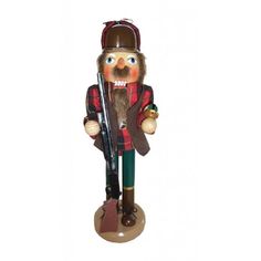 This 14" nutcracker is great for the hunter.  He is dressed in flannel with a matching hat. He carries his duck decoy in one hand and his 12 gauge in the other. Tiki Head, Nutcracker Decor, Witch Figurines, Metal Pumpkins, Bunny Mom, Duck Hunter, Snowman Figurine, Bear Costume, Santa's Workshop