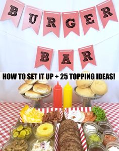 a table topped with lots of food and buns