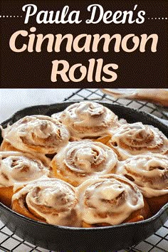 a pan filled with cinnamon rolls covered in icing