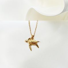 "TINY TURTLE necklace, gold plated Silver 925 realistic Turtle charm, tortoise Animal jewelry, Turtle Lover gift, swimming sea turtle jewelry ♡ DESCRIPTION  A dainty tiny  necklace with beautiful filigree  tortoise charm. ♡ DETAILS   turtle high: 1.4 x 1.6 cm- 0.55\" x 0.62\" Total chain length : 16.5\"(42 cm) Material: gold plated 24 k over sterling silver 925  extender chain you can find here: https://www.etsy.com/listing/723669241/add-an-extender-chain-with-tiny-heart?ref=shop_home_active_2 ♡ Sea Animals Jewelry, Swimming Sea, Sea Turtle Jewelry, Tiny Necklace, Turtle Jewelry, Sea Jewelry, Tiny Turtle, Jewelry Summer, Turtle Charm