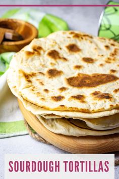 some tortillas are stacked on top of each other with the words sourdough tortillas above them