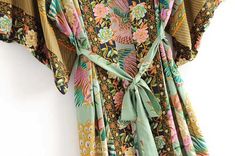 Indulge in luxury with our Classic and Elegant Floral Kimono. Versatile and stylish, this kimono features a beautiful floral design that can be paired with any outfit. Perfect for any occasion, elevate your wardrobe with this multi-purpose statement piece. Bohemian Style Kimono, Boho Queen, Green Kimono, Beach Bohemian, Maxi Kimono, Bohemian Kimono, Beach Kimono, Traditional Kimono, Summer Kimono