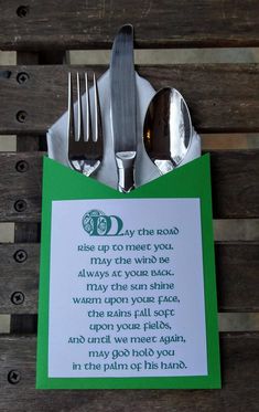 a fork, knife and spoon sitting on top of a napkin with a poem written in it