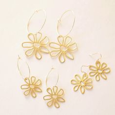 Add these funky flower hoop earrings to your outfit for the perfect statement piece! Gold filled and locally made in sunny San Diego by our friends at Sun & Ry, we're sure these'll be your new faves! Flower Hoop Earrings, Notes Gift, Statement Pieces, Sale Items, Gold Filled, San Diego, Hoop Earrings, Sun, Flowers