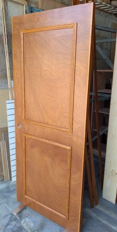 a wooden door is shown in the process of being made into a house or office